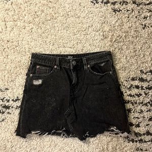 Grungy black jean skirt